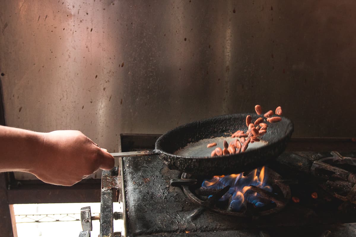 Roasting cacao beans for La Indita mole (Credit: Jackie Tran)