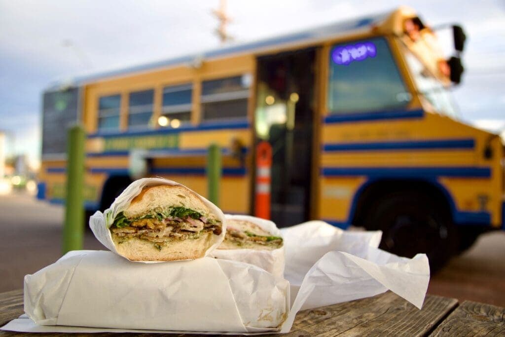 a sandwich sitting on top of a car