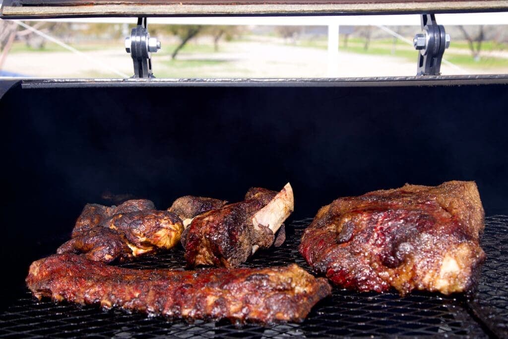 a large piece of meat on a grill