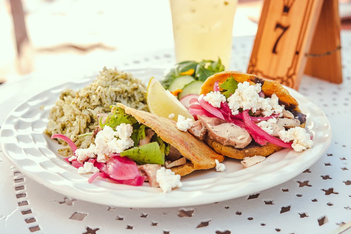 Gorditas with chicken and green rice at Fonda La Hermanita