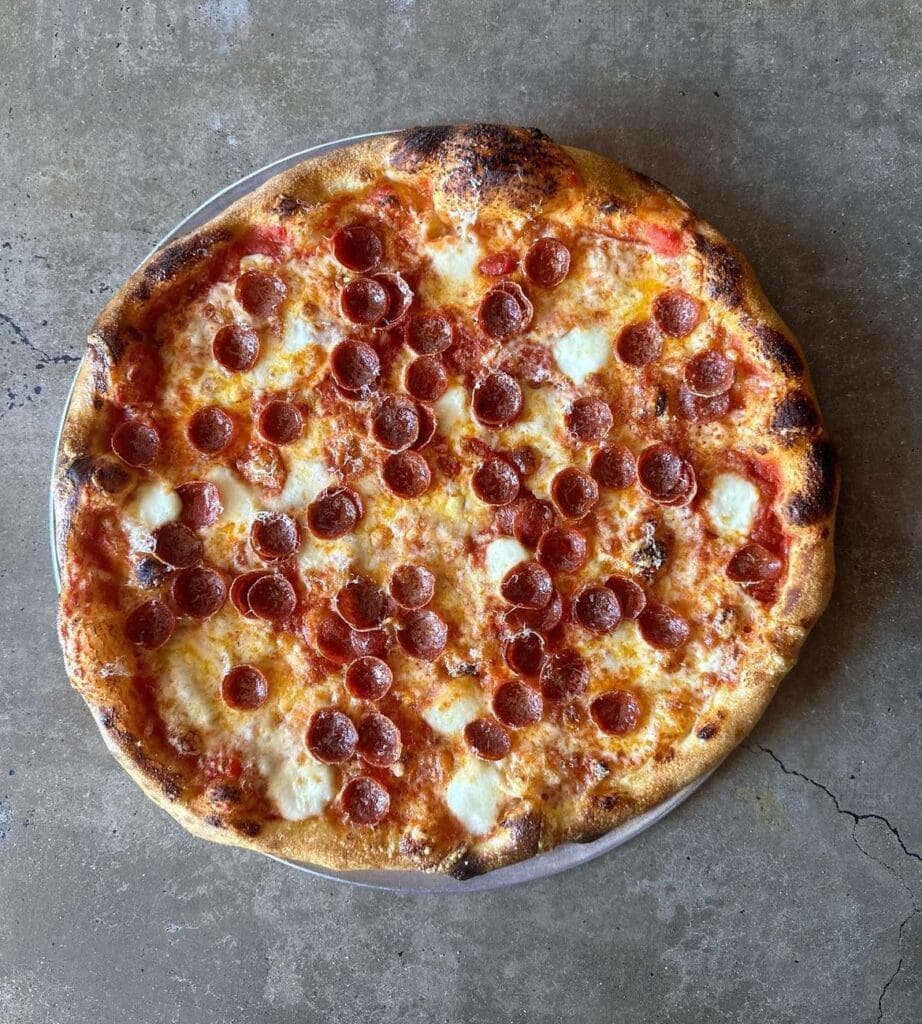 a close up of a slice of pizza