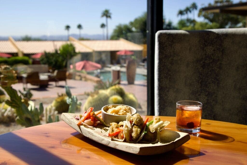 a plate of food on a picnic table