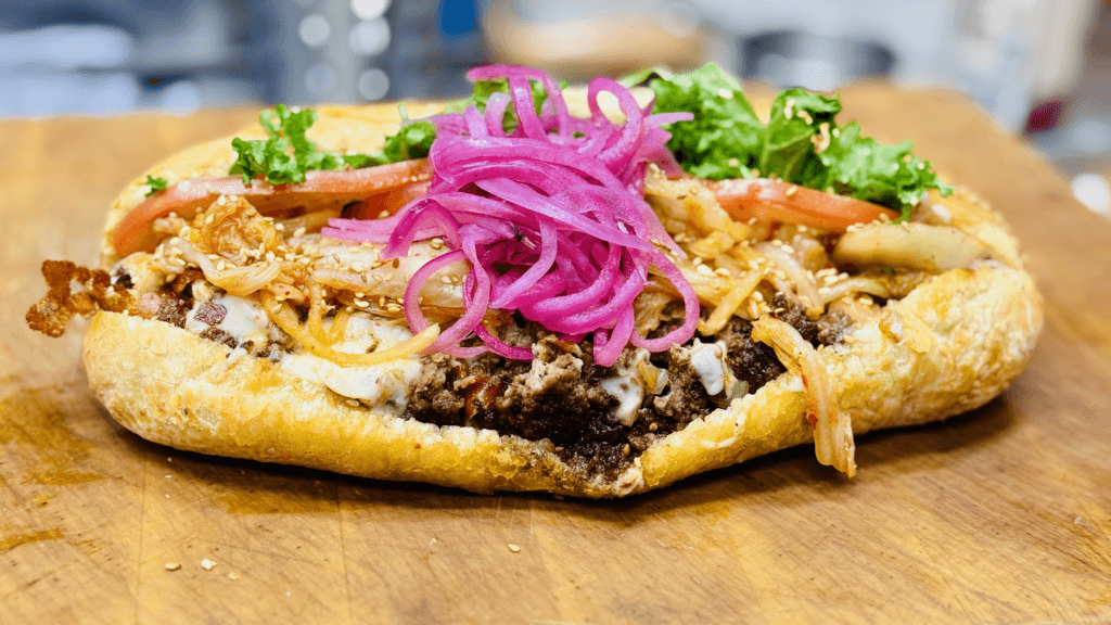 The Kimchi Chopped Cheese sandwich (Photo courtesy of Transplant Pizza)