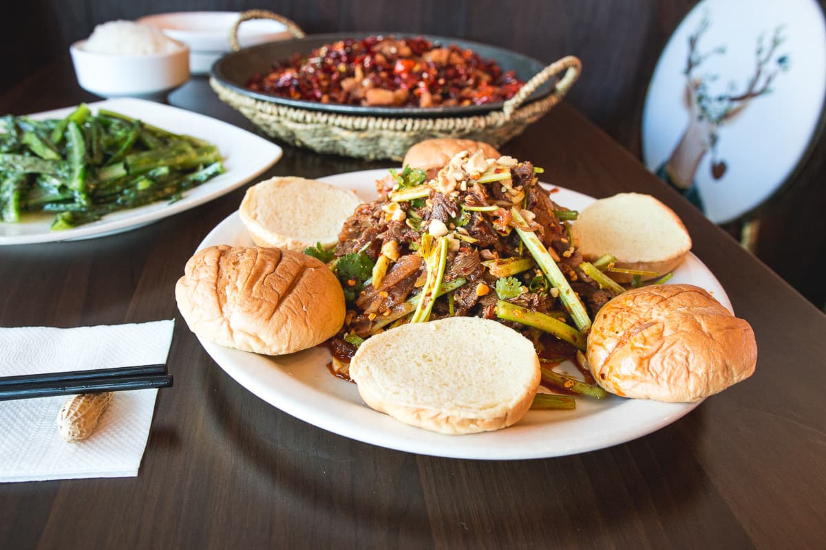 Singapore Style Spicy Sliced Beef and Ox Tongue Burger at Original Cuisine (Credit: Jackie Tran)