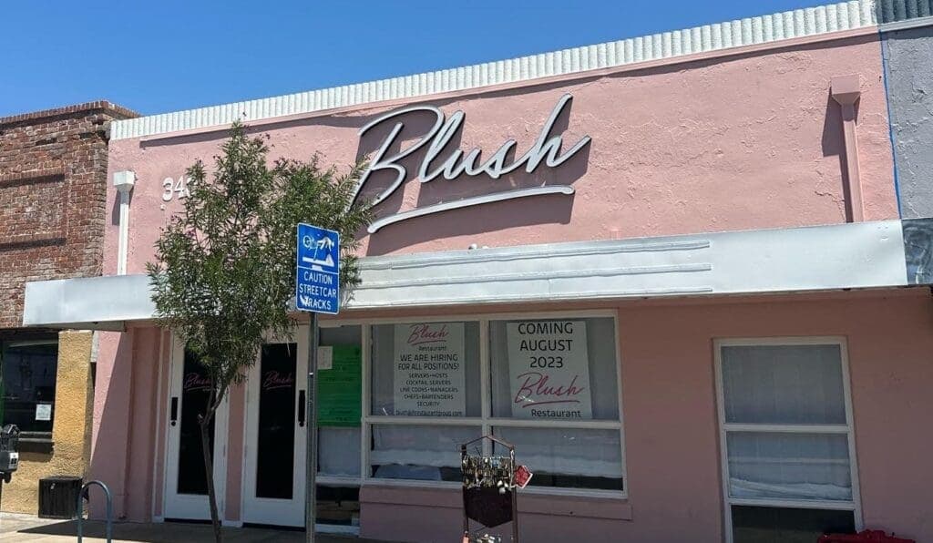 a sign on the side of a building
