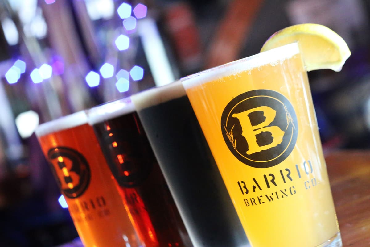 Barrio Brewing Company lineup of Hola Hefeweizen, Nolan's Porter, Barrio Rojo, and Raspberry Ale (Credit: Adam Lehrman)