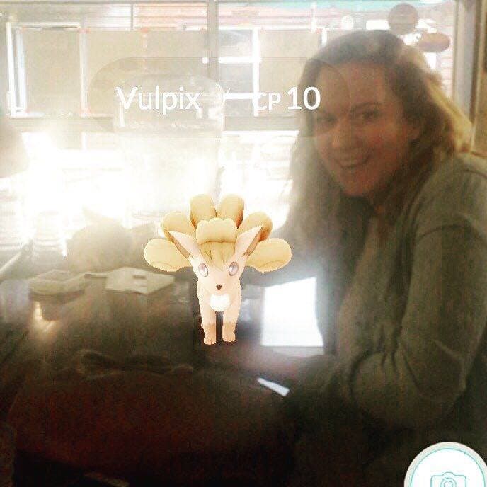 Vulpix on the bar with Andrea Mance at Tucson Hop Shop (Credit: Tucson Hop Shop)