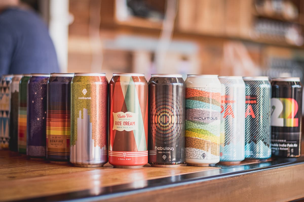 Cans of beer from Pueblo Vida Brewing Co. (Credit: Jackie Tran)