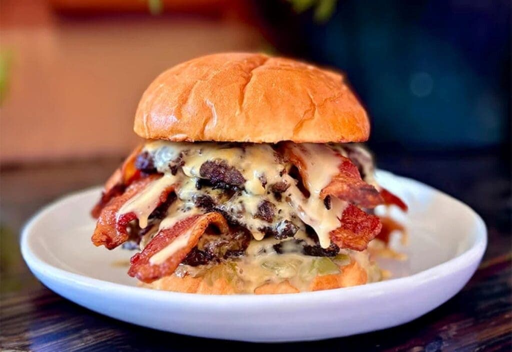 a sandwich sitting on top of a plate of food