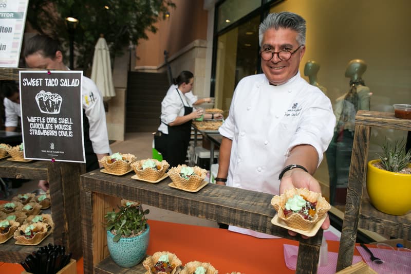 a man preparing food on a table