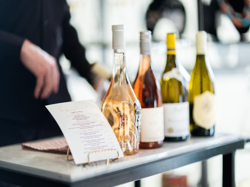 a close up of a bottle of wine on a table
