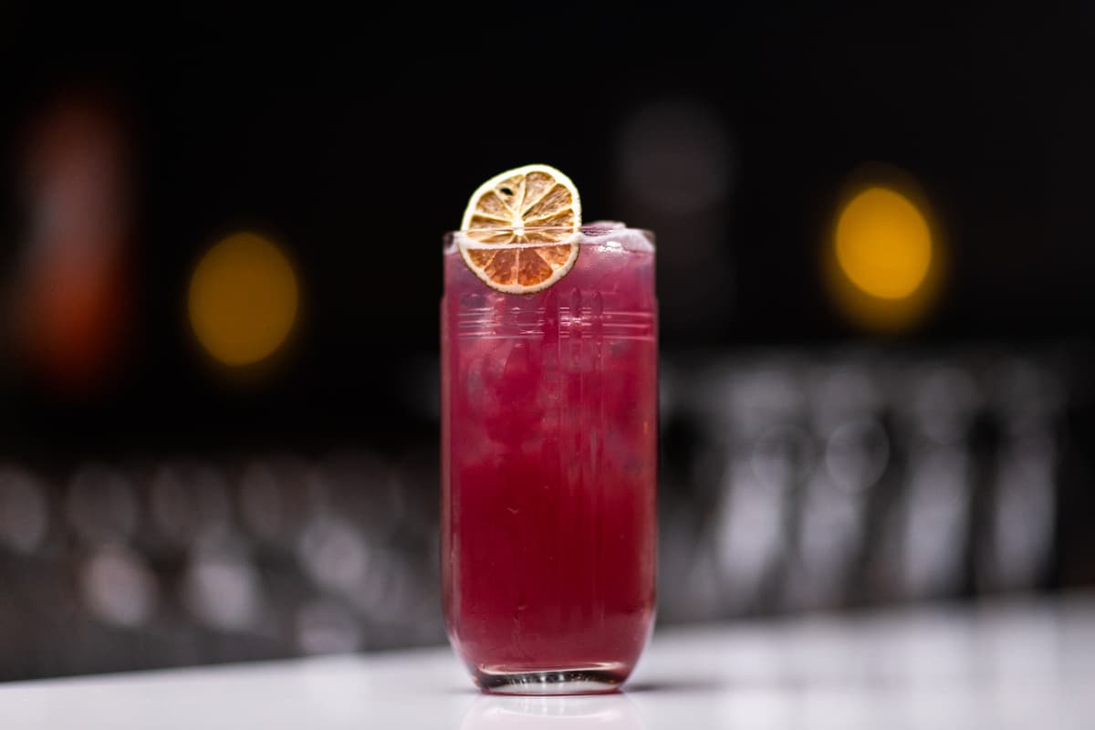 Purple Drink cocktail at Snake & Barrel (Photo by Taylor Noel Photography)