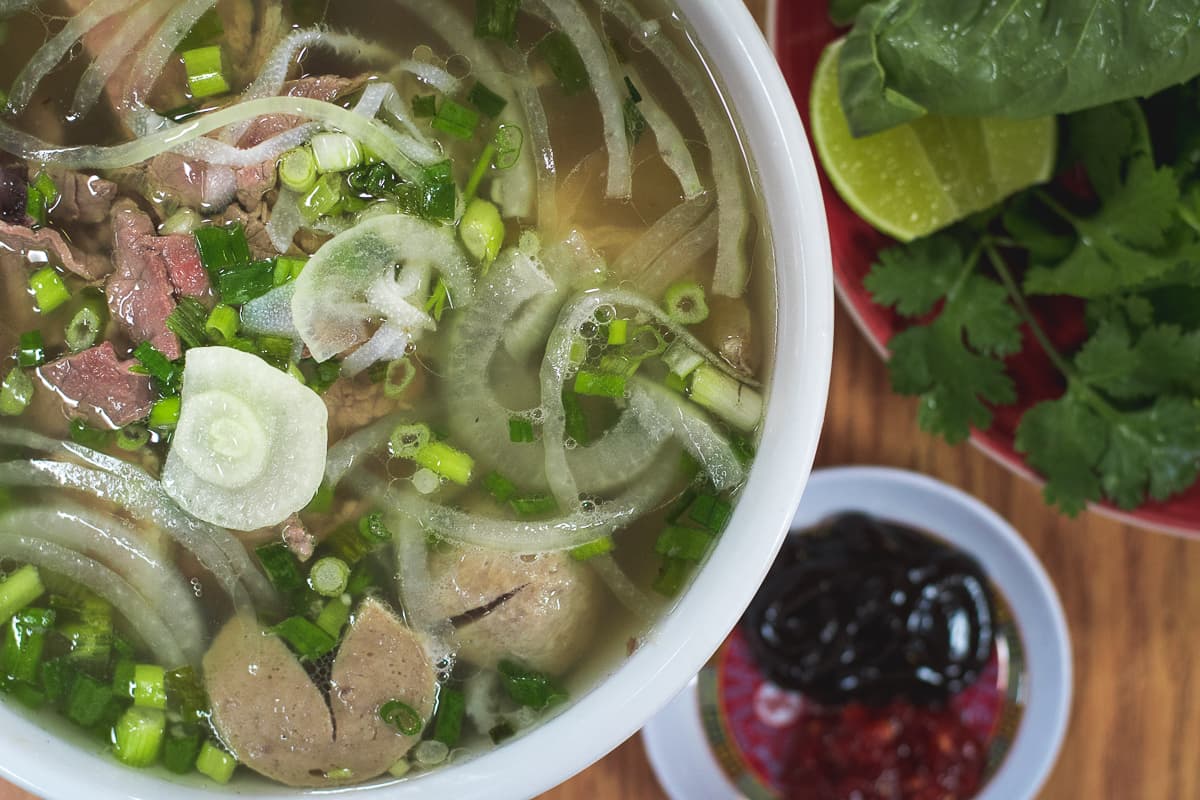 Pho with rare steak, well-done shank, brisket, tendon, tripe, and beef meatballs at Pho #1 (Credit: Jackie Tran)