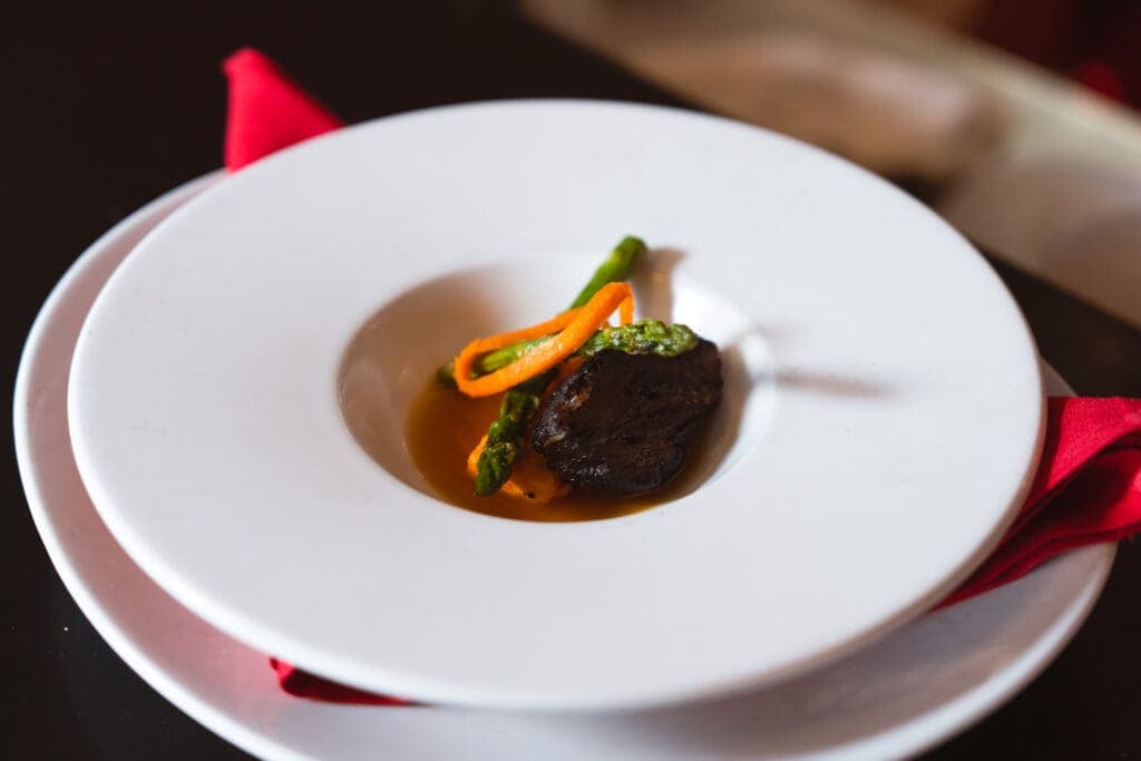Photo of the Fourth Course: Coffee Crusted Duroc Pork Tenderloin (Iron Chef Tucson Winning Dish!)