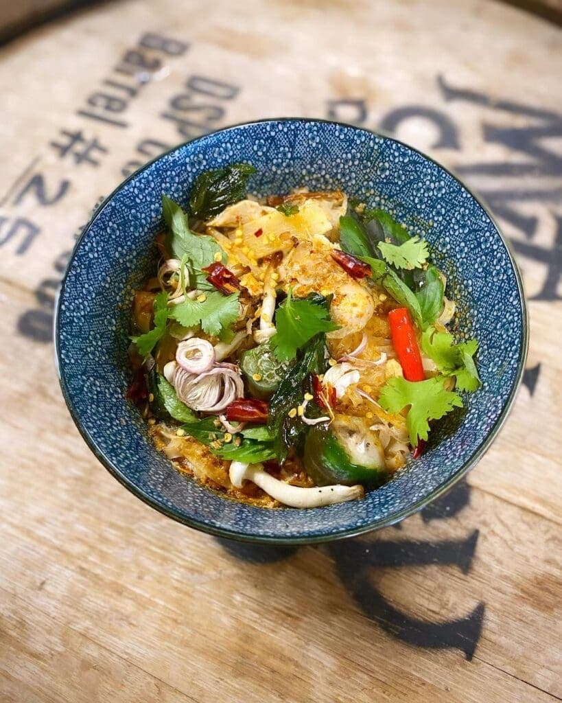 a bowl of food on a blue plate