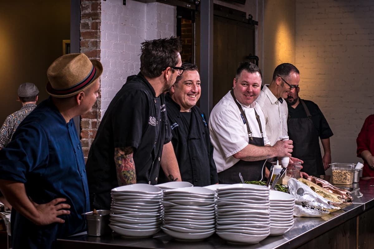 Chefs plating at a Gastronomic Union of Tucson (GUT) dinner at the Carriage House (Credit: Jackie Tran)
