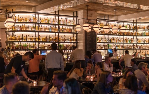 (pexels/<a href="https://www.pexels.com/photo/group-of-people-gathering-inside-bar-1058277/" target="_blank">EVONICS</a>) Winter season, a particularly busy time of year for the Tucson food & beverage industry