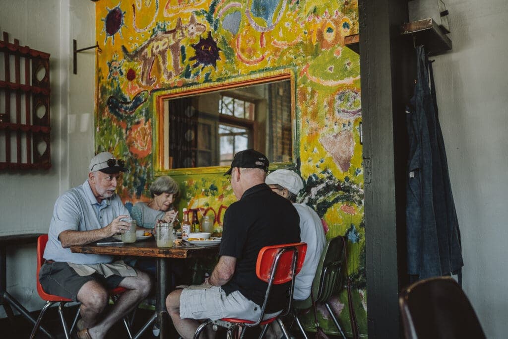 a group of people sitting in a chair
