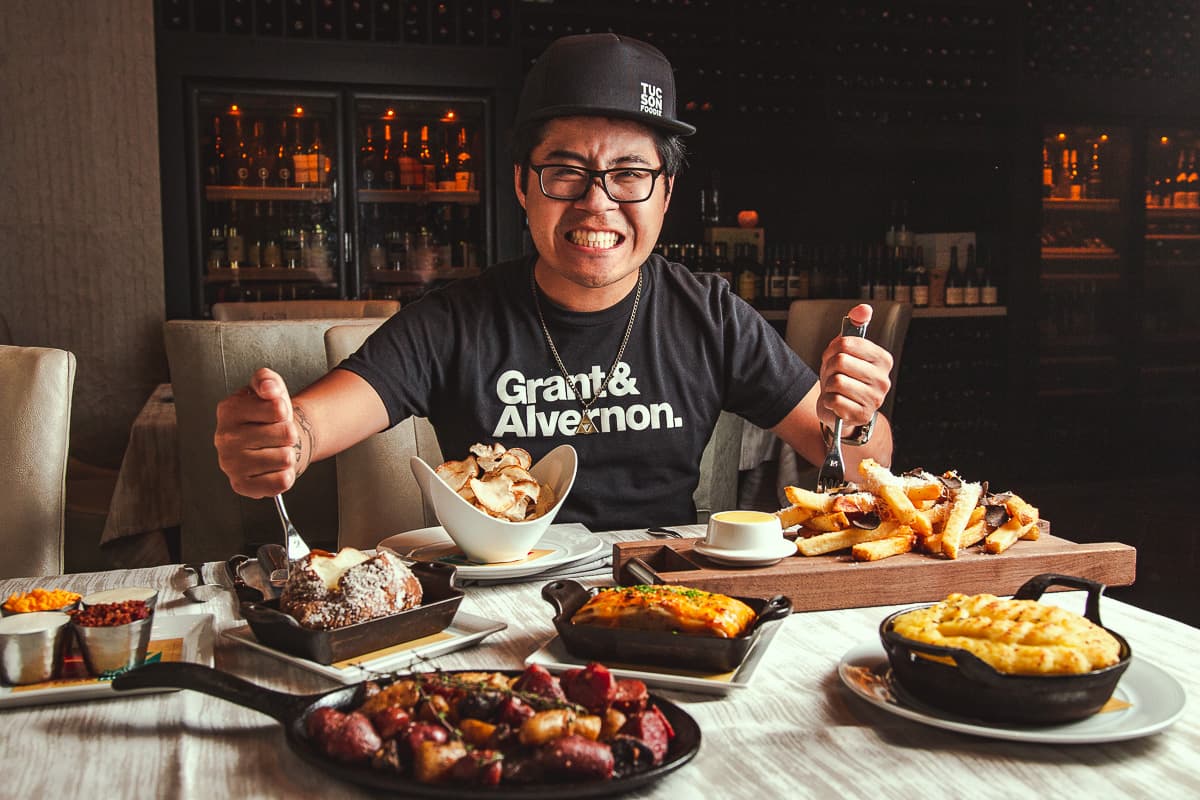 Jackie with $50 of potato dishes at PY Steakhouse (Credit: Melissa Stihl)