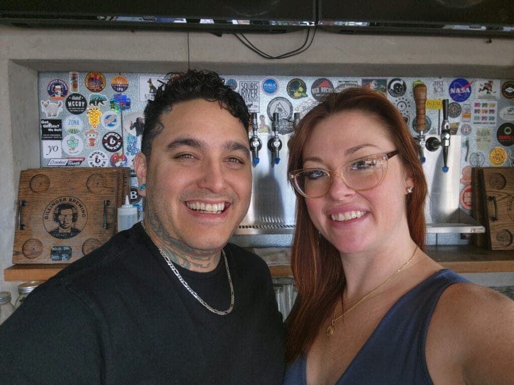 a couple of people posing for the camera