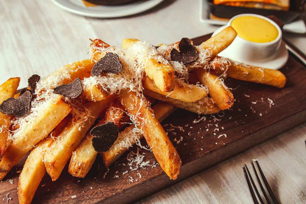 White Truffle French Fries plus freshly shaved black truffle at PY Steakhouse (Credit: Jackie Tran)