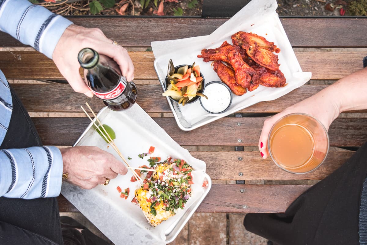 Street Corn and HOCO Hot Wings at Plaza Eats (Credit: Jackie Tran)