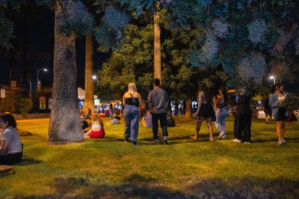 a group of people in a park