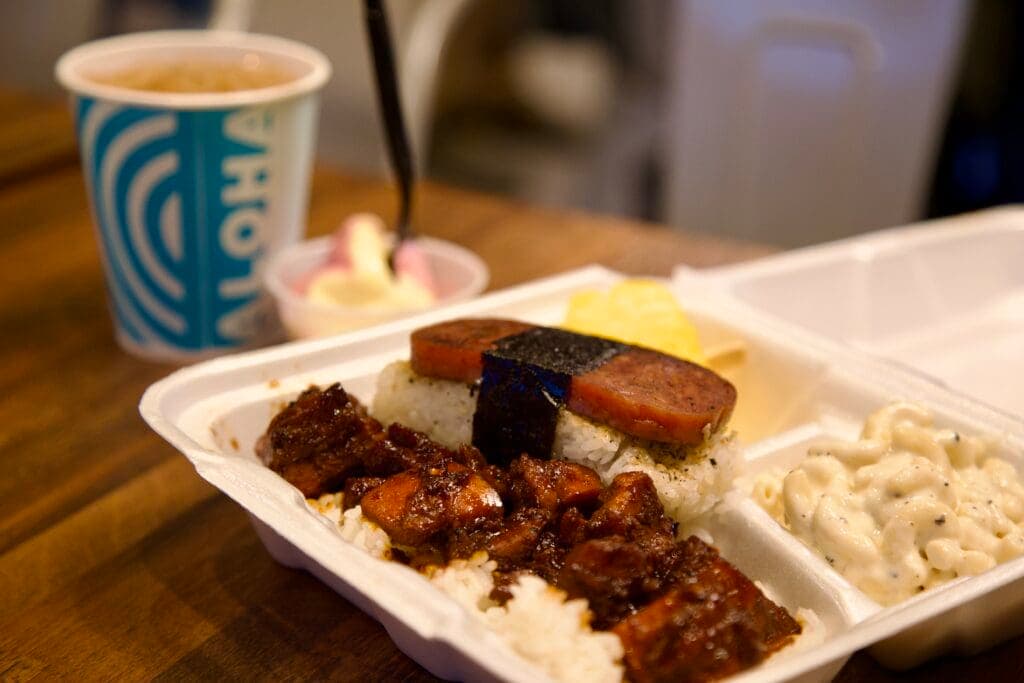 a plate of food and a cup of coffee