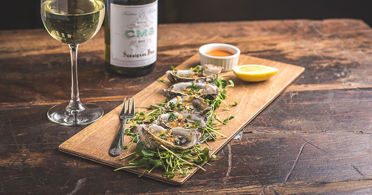 Baked Oysters at Agustin Kitchen (Photo by Jackie Tran)