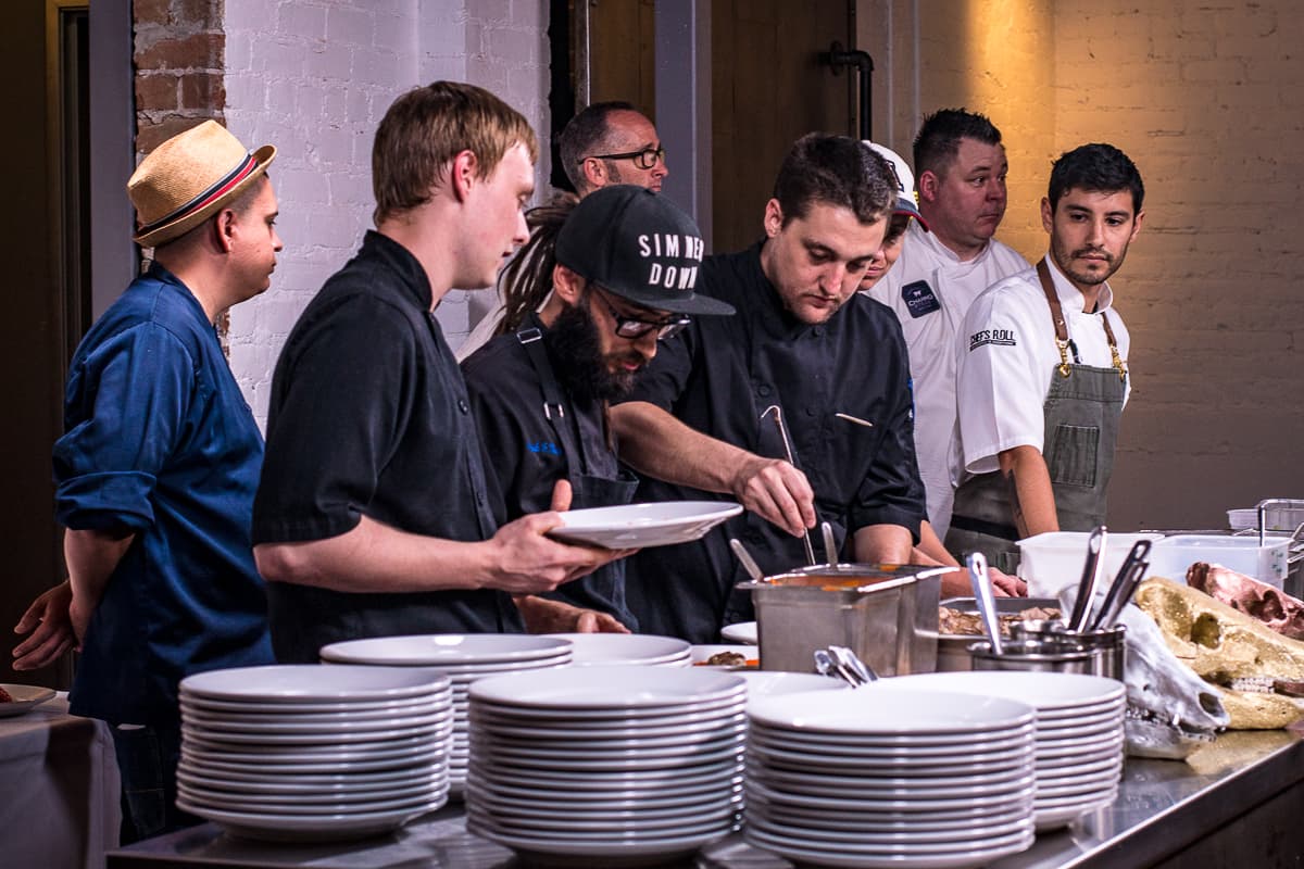 Chefs plating at a Gastronomic Union of Tucson (GUT) dinner at the Carriage House (Credit: Jackie Tran)