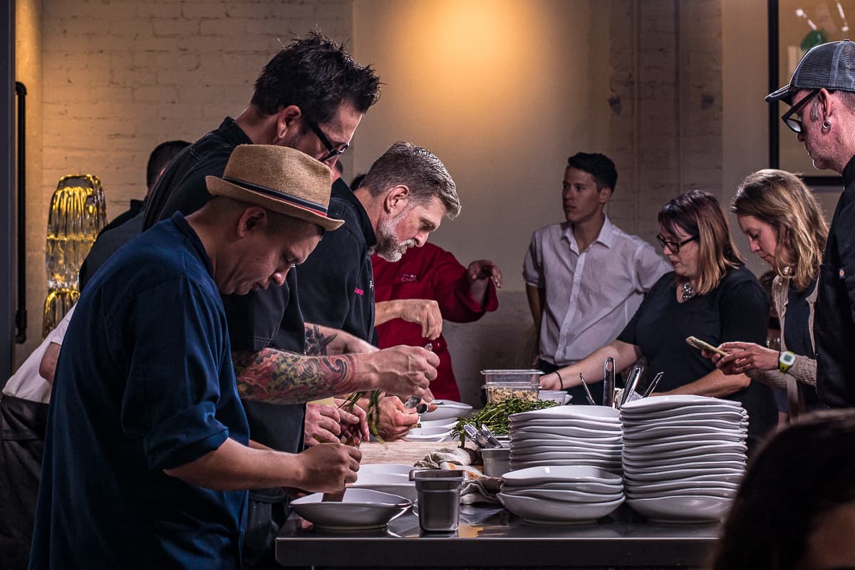 Chefs plating at a Gastronomic Union of Tucson (GUT) dinner at the Carriage House (Credit: Jackie Tran)