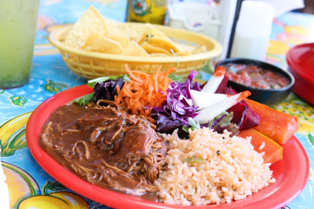 Pollo en mole negra at the Little One (Credit: S. Manuel)