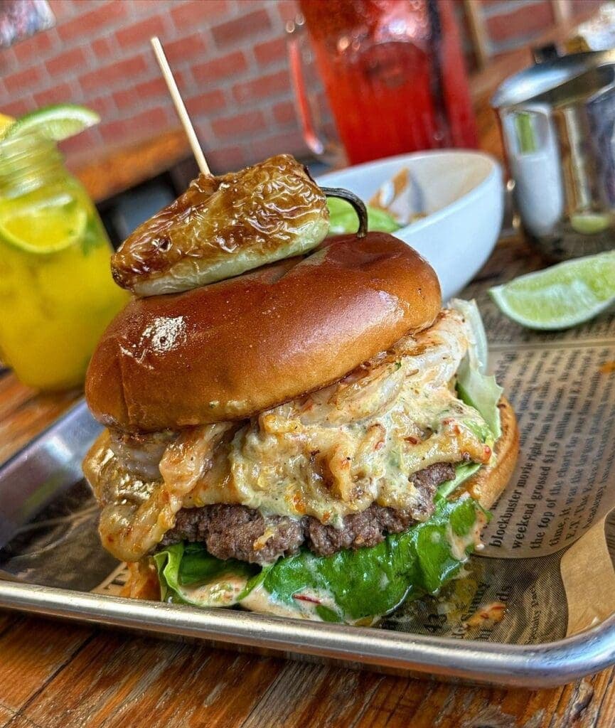 a sandwich sitting on top of a wooden table