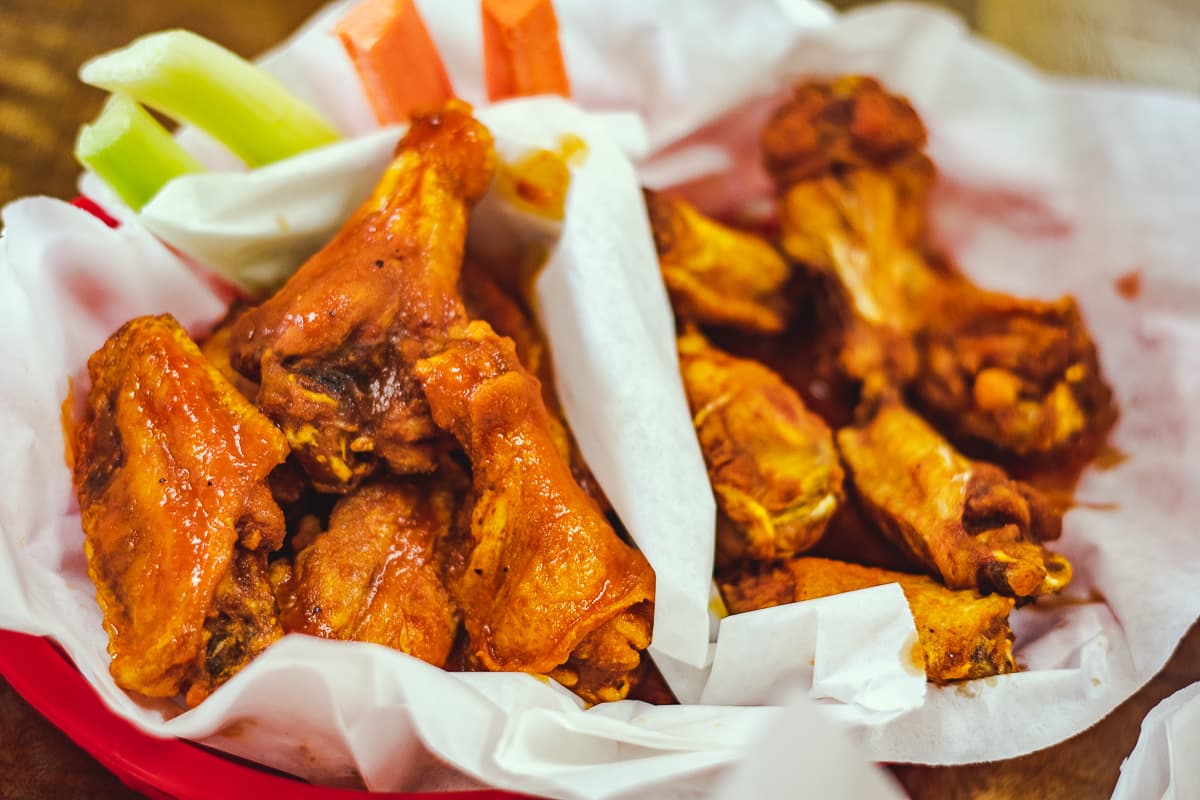 Regular Wings with Buffalo and Chile Lime sauce at Wings on Fire (Credit: Kate Severino)