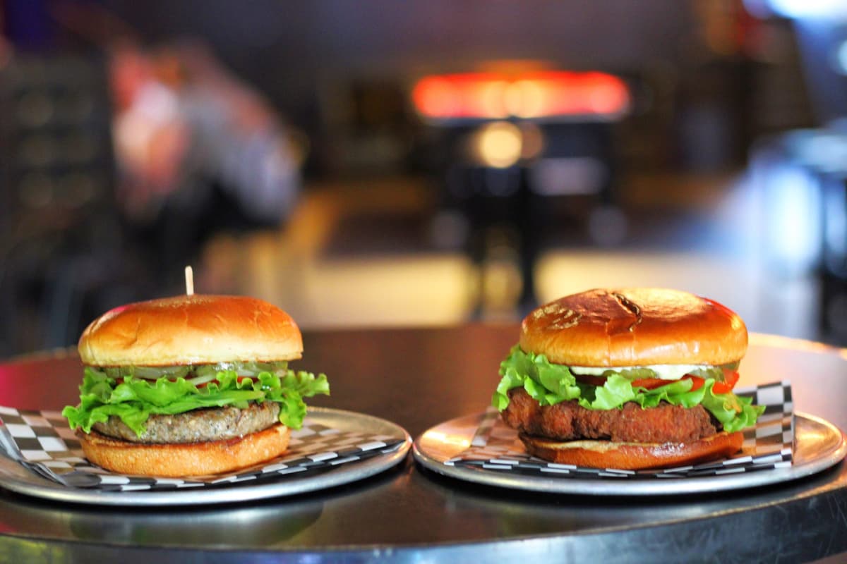 Royale Burger and the Fried Chicken Sandwich at Surly Wench (Photo by Mark Whittaker)