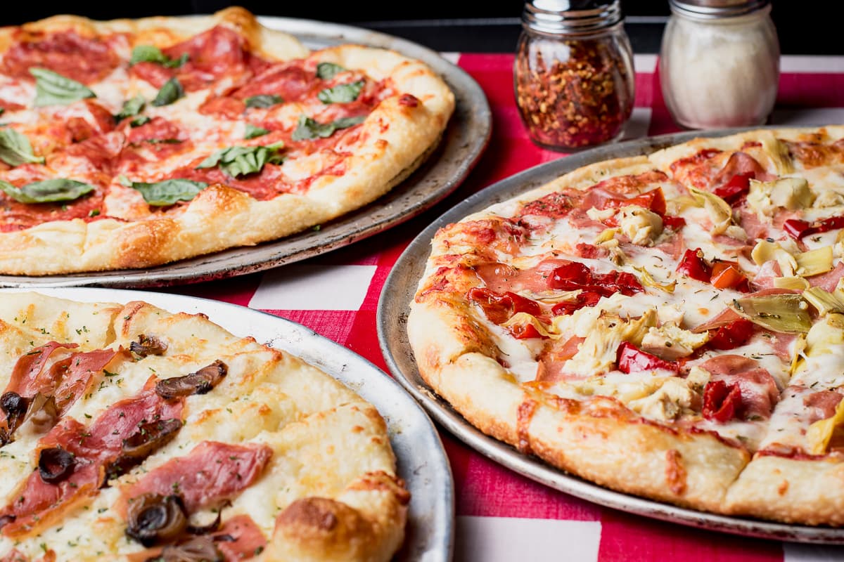 Free Pizza Slices & Barrio Brewing Co. Beer Samples at Mama Louisa’s January 27
