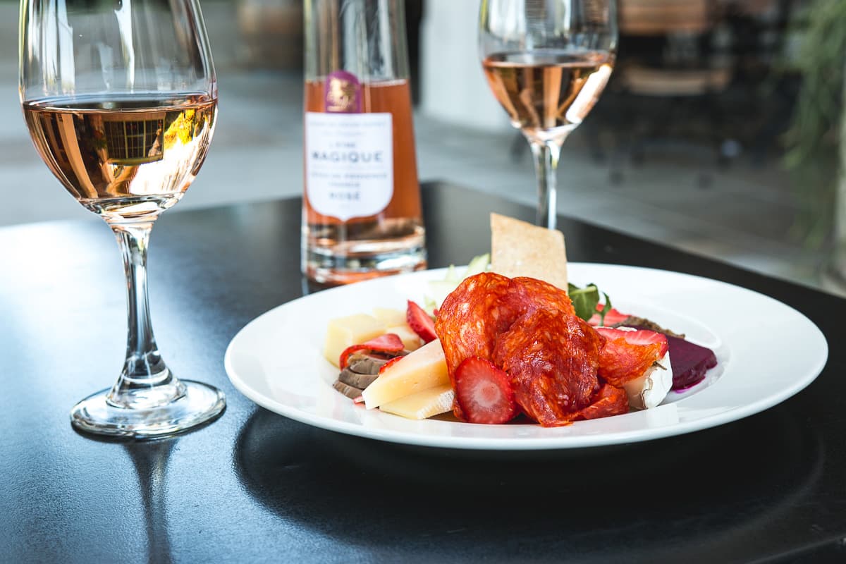Happy hour calls for patio dining with light bites & affordable cocktails at Maynards Market