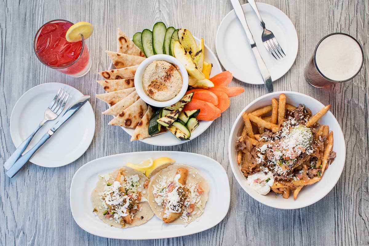 New happy hour menu, $5 “Cocktail of the Week” at Playground Bar & Lounge