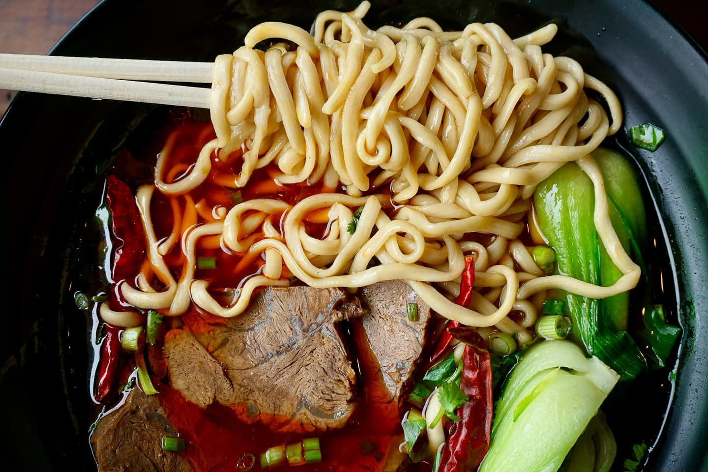 Warm up for Lìdōng at Noodleholics with friends and noodles