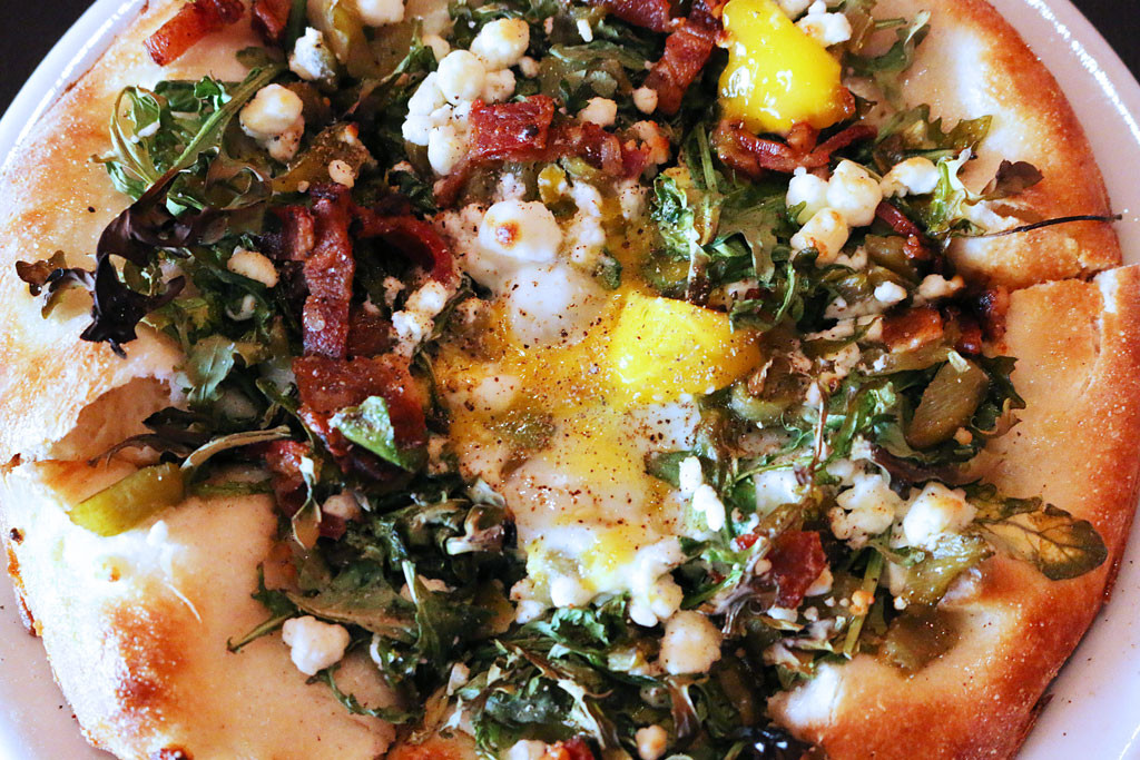 Bacon, Arugula, Roasted Green Chile, Goat Cheese, and Egg Breakfast Pizza at Renee's Organic Oven