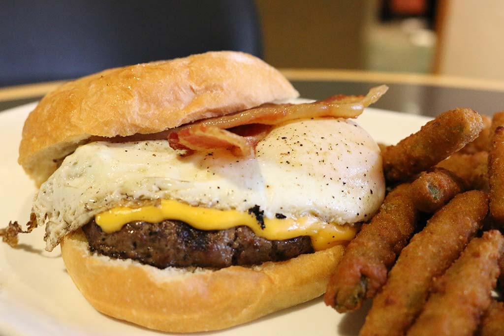 Grass-fed beef and egg-topped burger at The Cellar Bistro