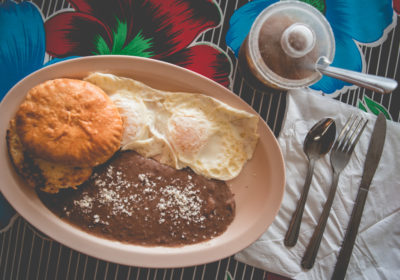 Mother Hubbard's Early Bird Special with two over-easy eggs, beans, and a sourdough biscuit (Credit: Jackie Tran)