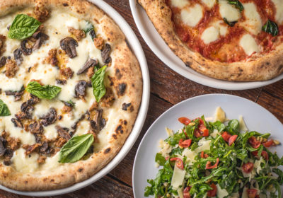 Pizza Bianca, Pizza Margherita, and Insalata Arugula from Fiamme Pizza Napoletana (Credit: Jackie Tran)