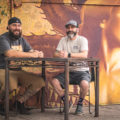 The Drunken Chicken owners Ben Sattler and Micah Blatt in the patio of Mr. Head's Art Gallery and Bar (Credit: Jackie Tran)