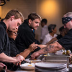 Chef Sam Krajnak plating at a Gastronomic Union of Tucson (GUT) dinner at the Carriage House (Credit: Jackie Tran)