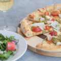 Pizza, salad, and wine for Sauce Pizza & Wine's Summer Sampler