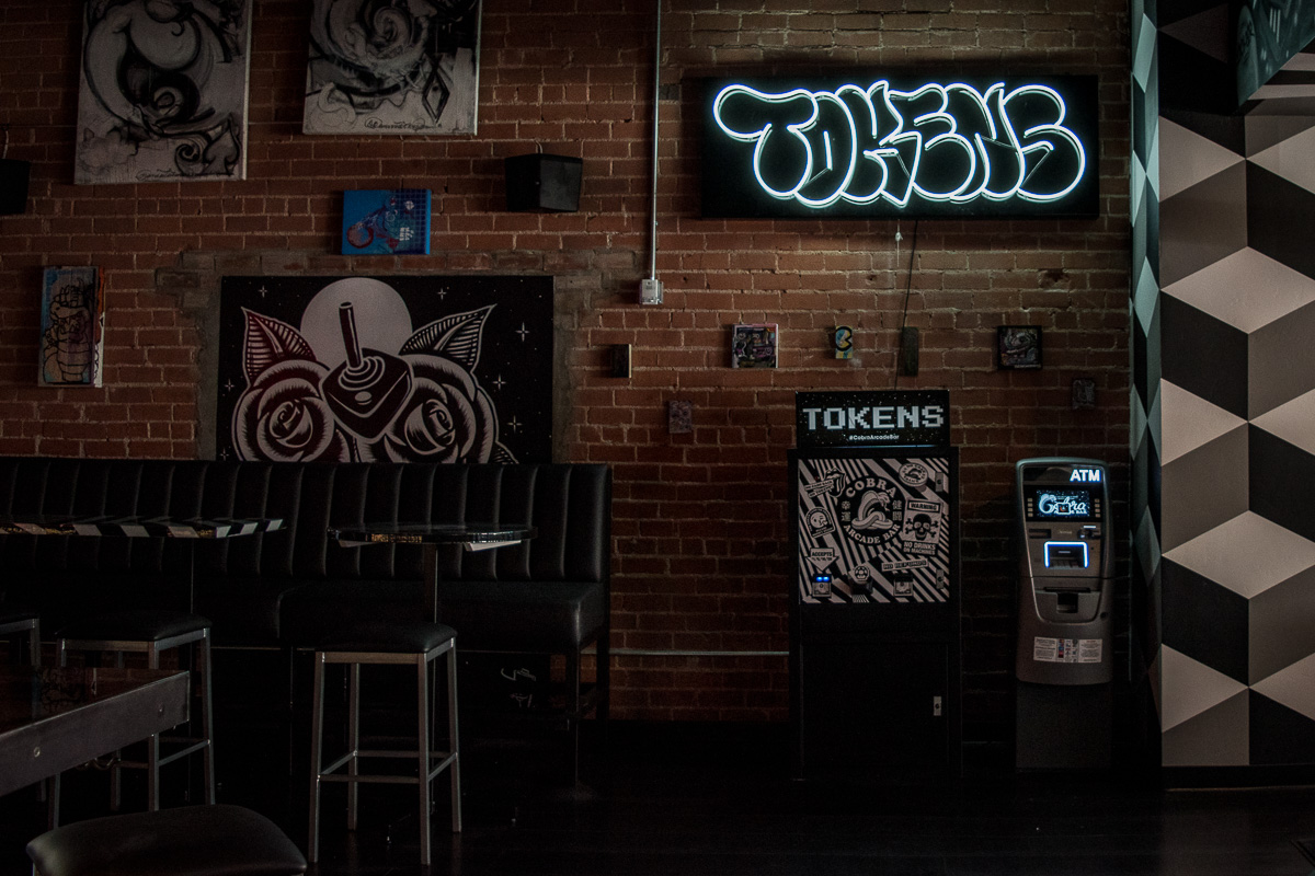 Token machine and ATM at Cobra Arcade Bar (Credit: Jackie Tran)