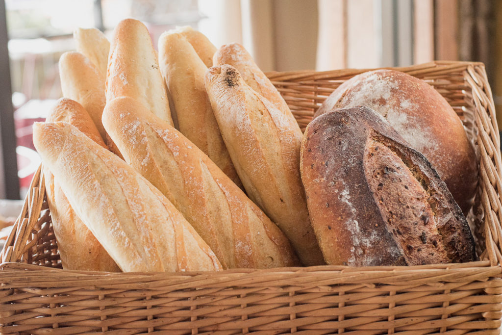 Baguettes and pain de campagne at Ghini's French Caffe and La Baguette Bakery (Credit: Jackie Tran)
