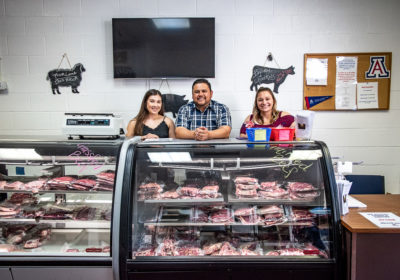 Staff and assorted local meat at the University of Arizona Food Products and Safety Laboratory (Credit: Jackie Tran)