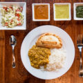 Paneer empanada, dahl, and rice at Bombolé Eatery (Credit: Jackie Tran)